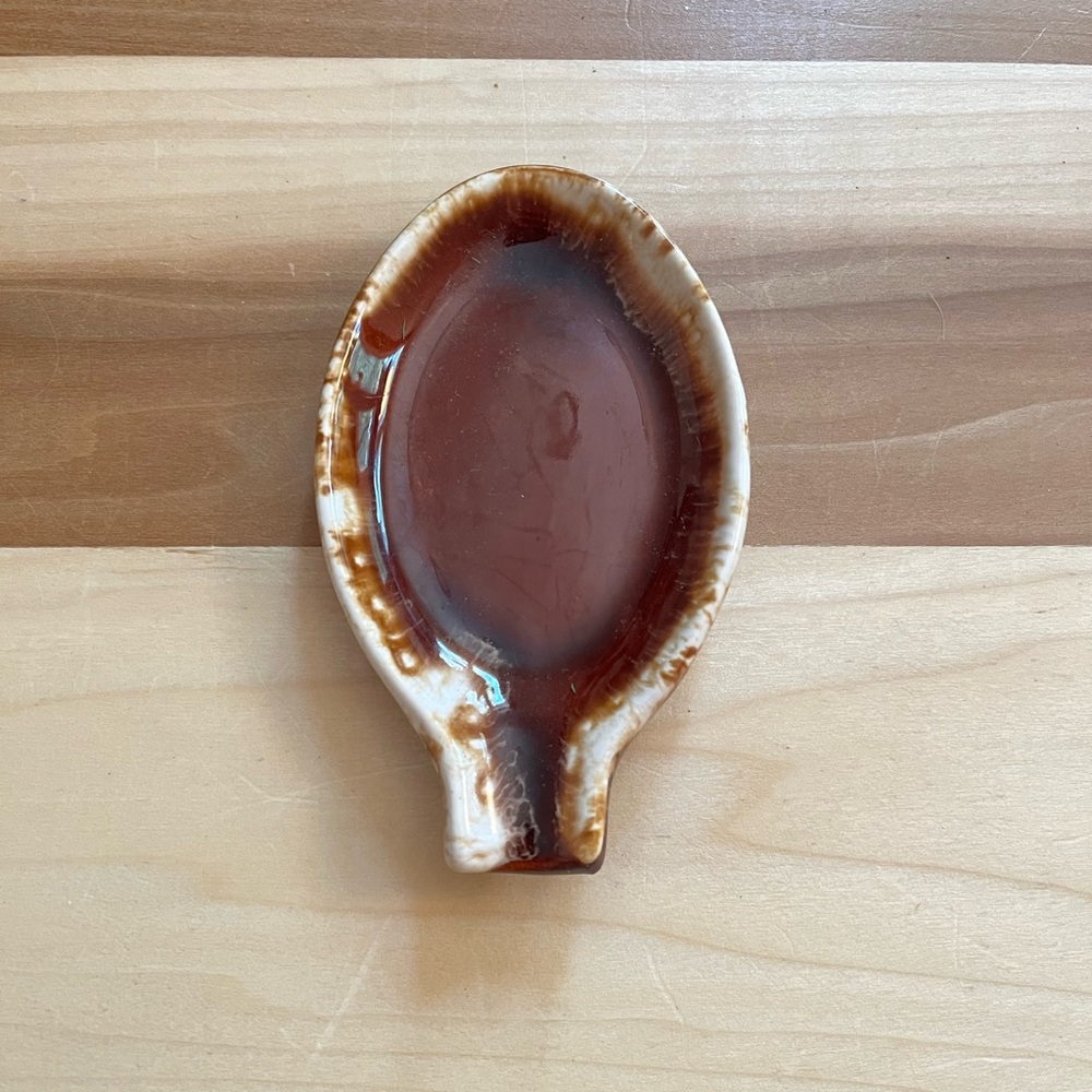 Stove top spoon holder